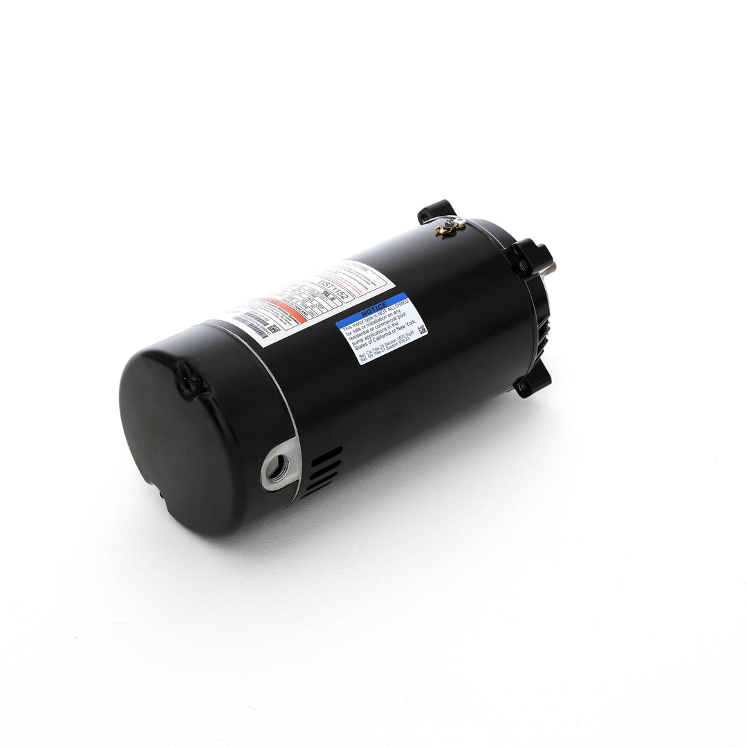 Century pool pump motor black cylindrical housing with threaded shaft and multiple information labels on side