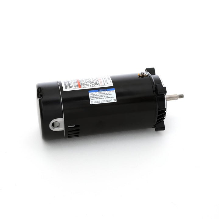 Century pool pump motor model UST1152 in black with threaded shaft and attached label showing specifications lying on white background