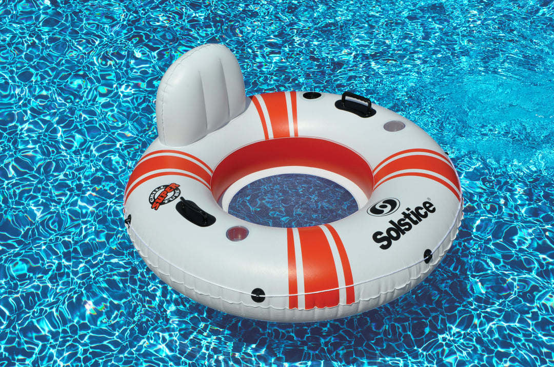 white and orange inflatable river tube with backrest and handles floating on clear blue water in a swimming pool