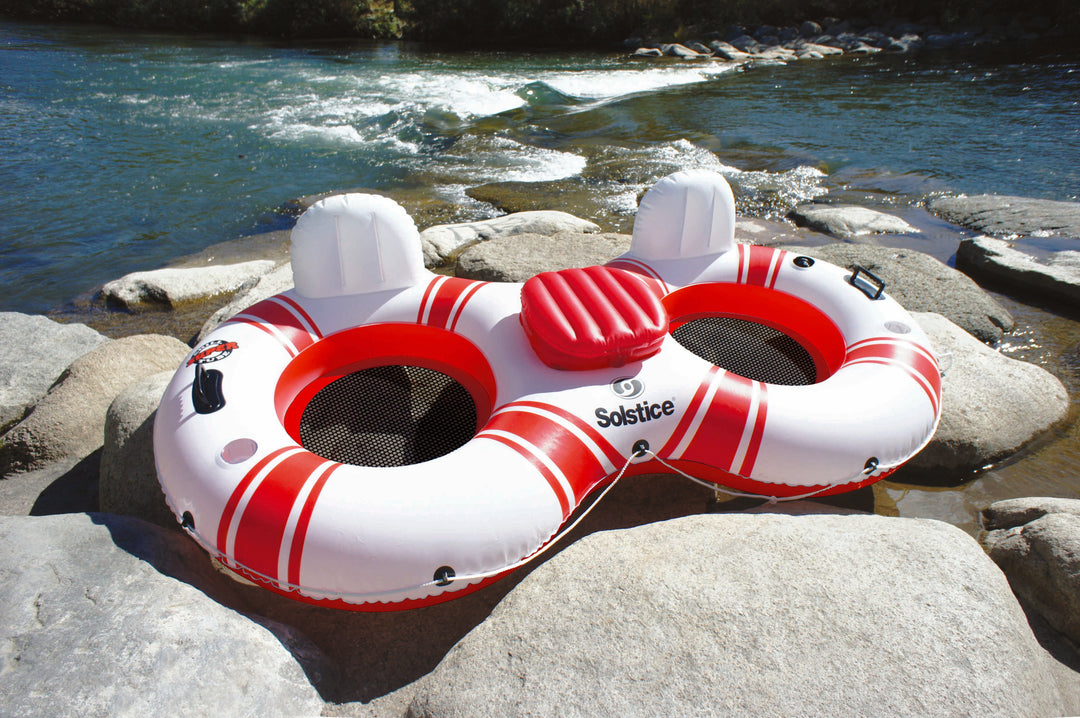 Double river tube float with two white backrests and cooler seat in the center, predominantly white with red stripes