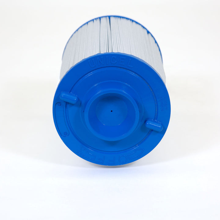 Cylindrical white pleated filter cartridge with a blue plastic top labeled Unicel with a central threaded opening and side tabs