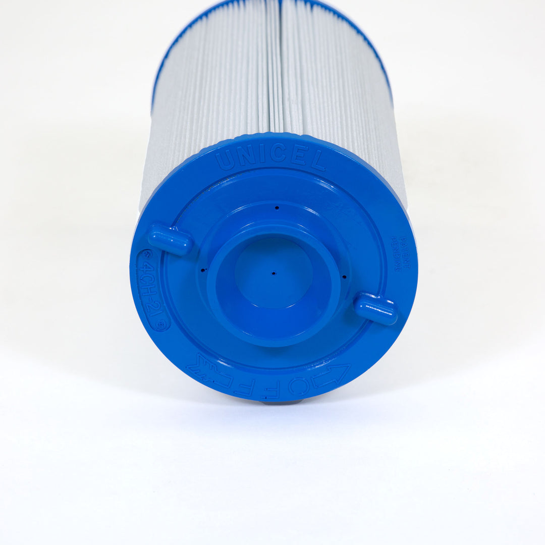 cylindrical pool filter cartridge with white pleated material and blue plastic end cap labeled unicel and 4CH-21 on white background