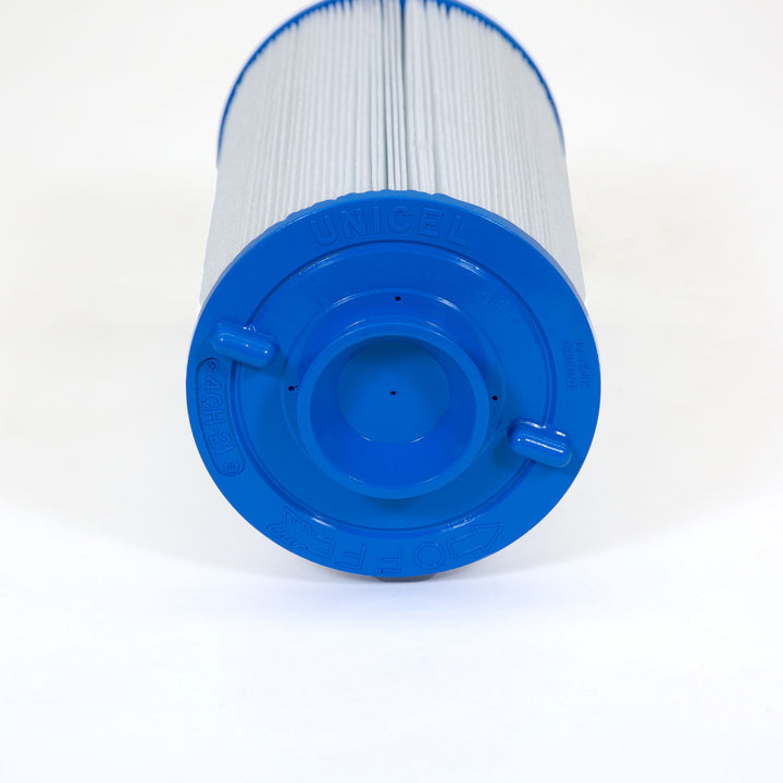 cylindrical pool filter cartridge with white pleated material and blue plastic end cap labeled unicel and 4CH-21 on white background