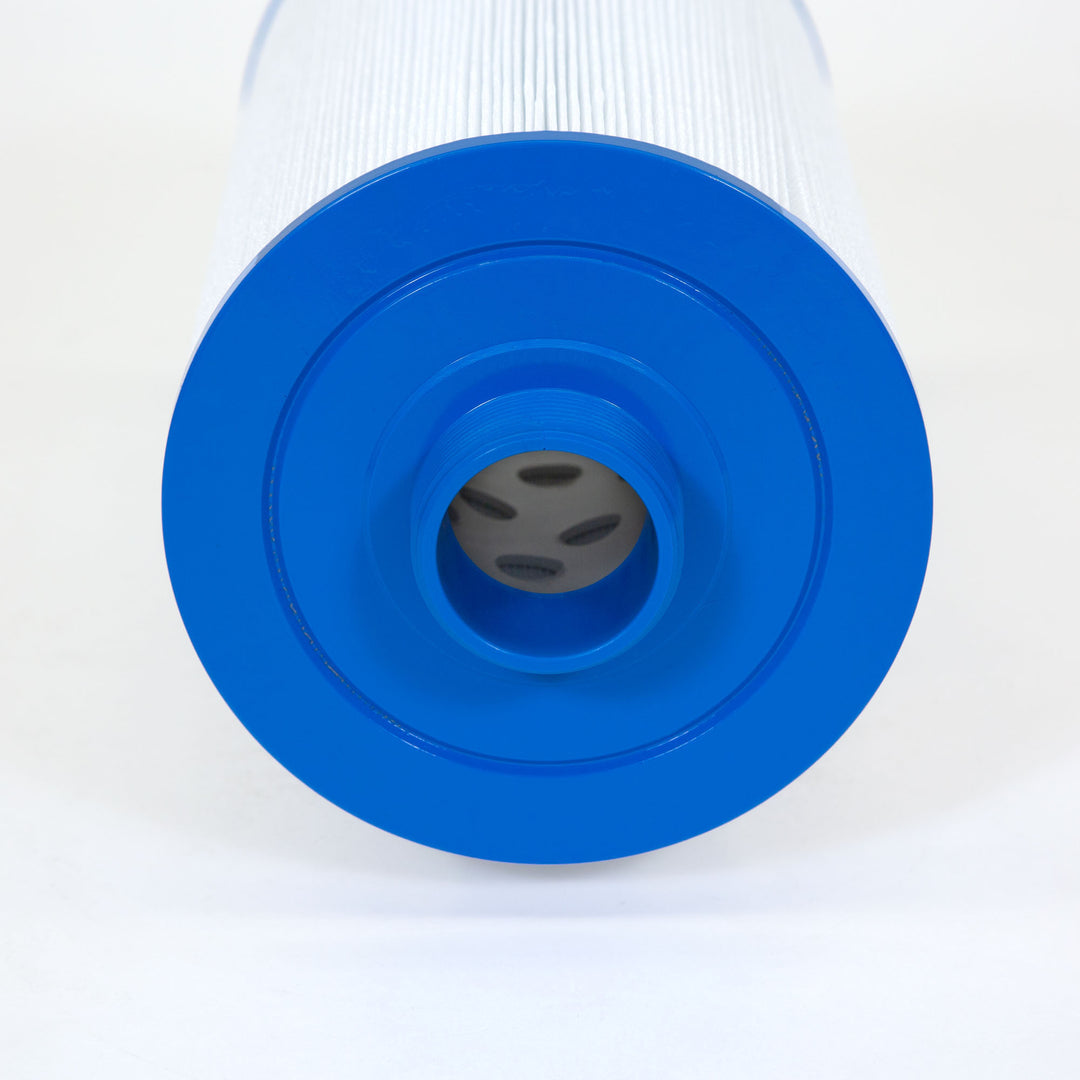 Close-up view of a cylindrical white filter cartridge with blue plastic end cap featuring a central circular opening