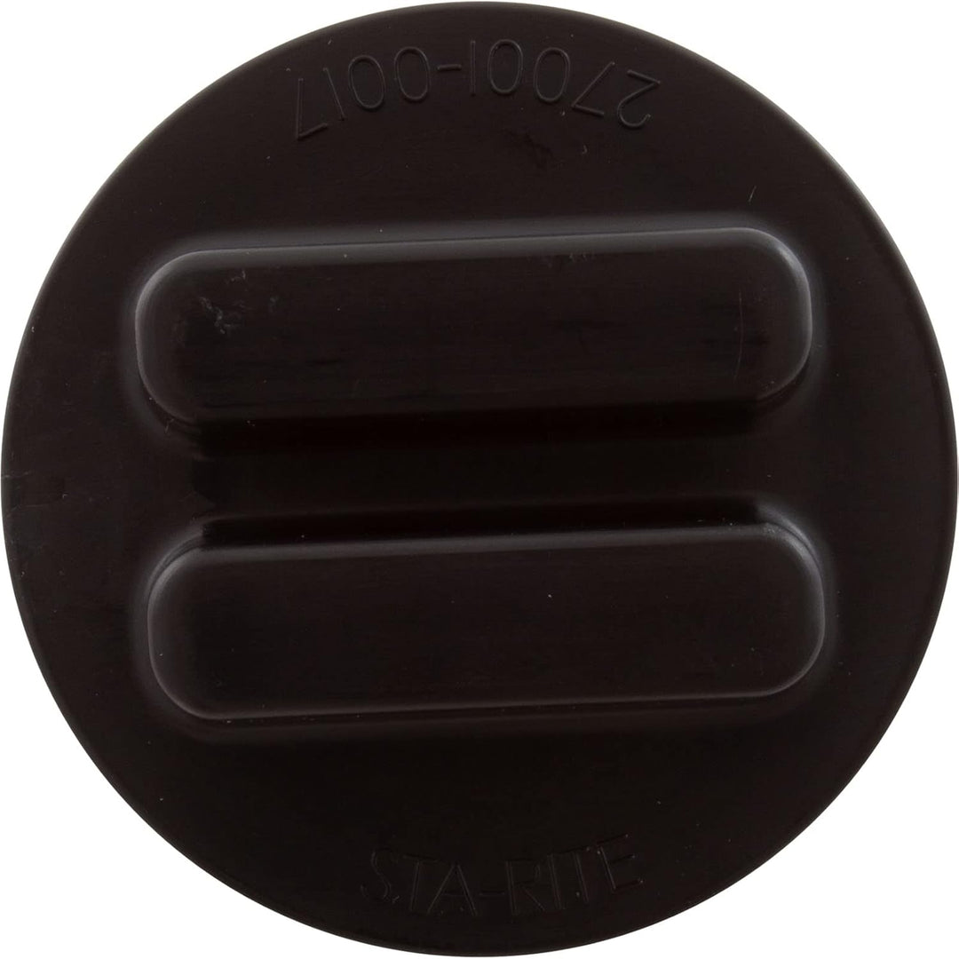 round black plastic drain plug with two raised rectangular grips on top and embossed text