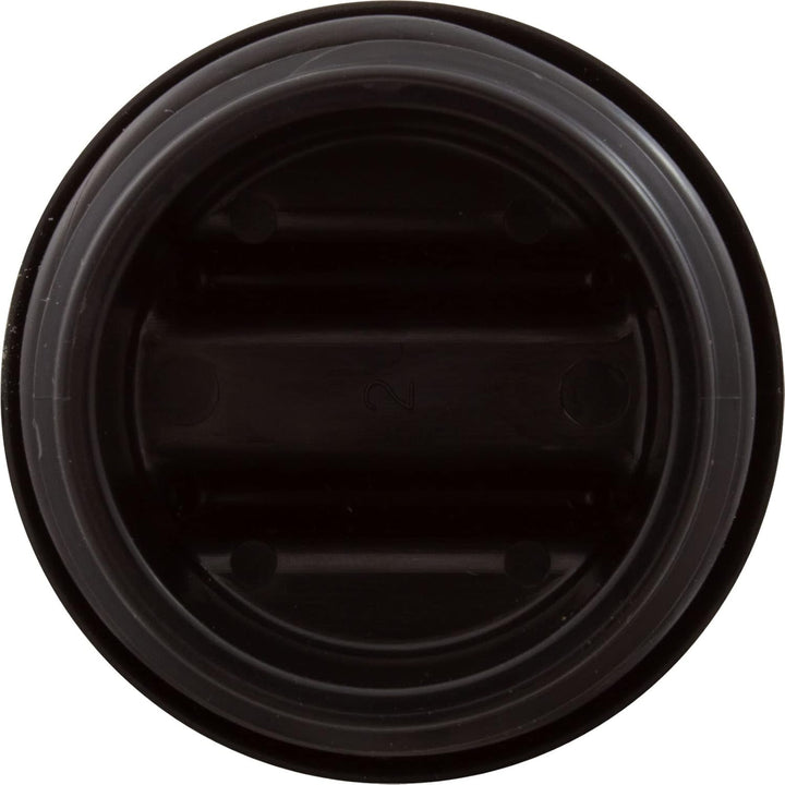 round black drain plug assembly with horizontal ridges and circular grooved edge for sealing