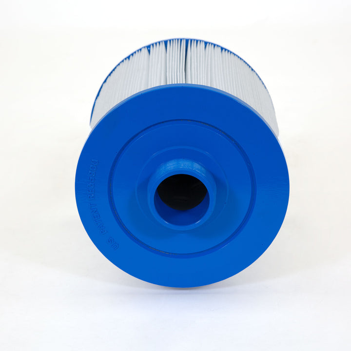 cylindrical replacement pool filter cartridge with white pleated material and blue plastic ends shot from the top