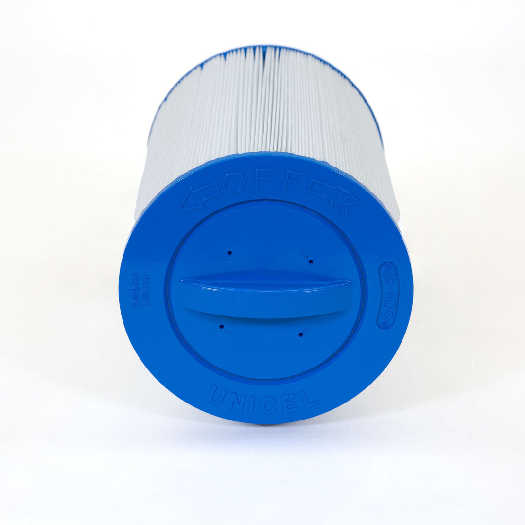 cylindrical spa filter cartridge with white pleated material and bright blue plastic end cap placed on white surface