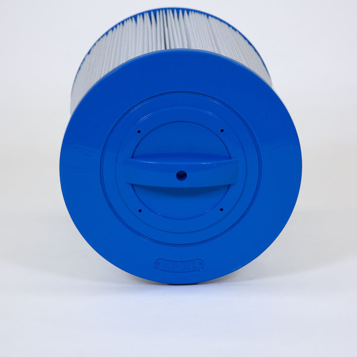 Cylindrical white filter with blue plastic end cap featuring a handle and small perforations on a plain white surface