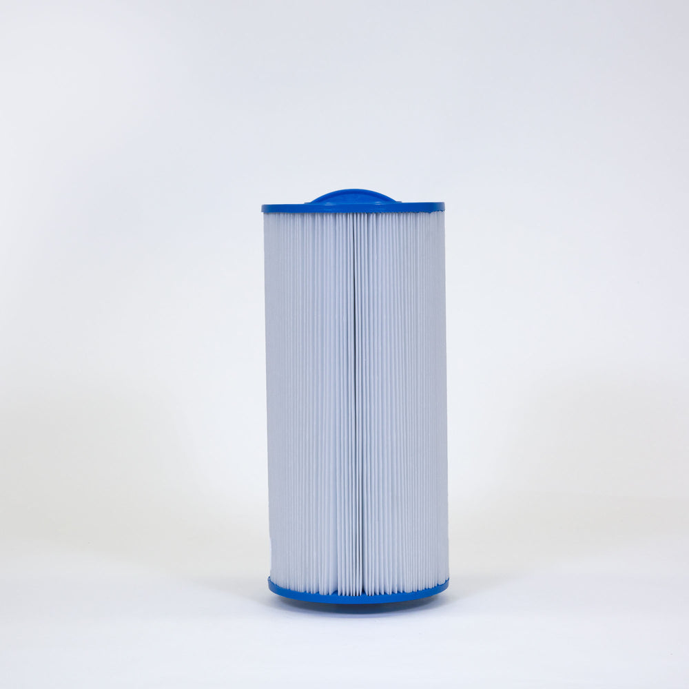 cylindrical white replacement filter cartridge with blue plastic caps at both ends standing upright on a white surface with a plain white background
