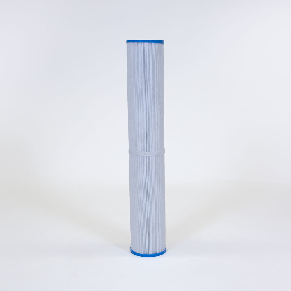 Tall cylindrical pool filter cartridge with white pleated material and blue caps on both ends standing upright on white surface