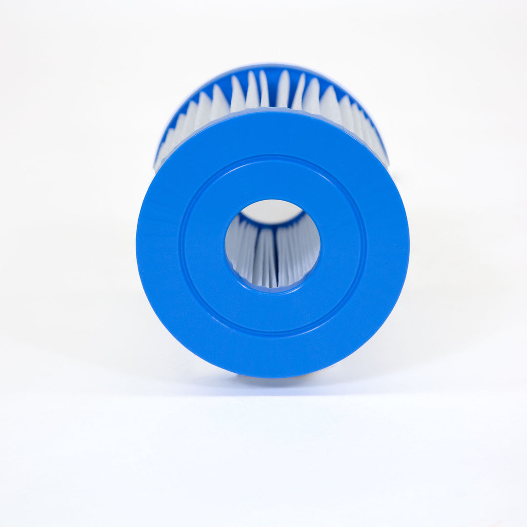 cylindrical filter cartridge with blue plastic end caps and white pleated filter material inside on white background