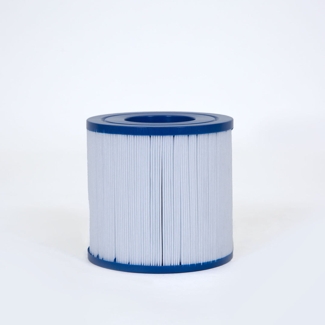 Cylindrical pool filter cartridge with white pleated material and blue plastic top and bottom edges on a plain background