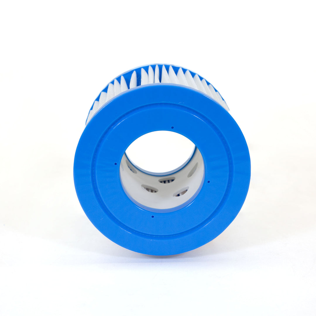 cylindrical blue and white pool filter cartridge laid horizontally on plain white background showing circular blue end with central hole