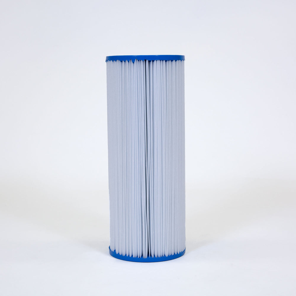 tall cylindrical pool filter cartridge with pleated white material and blue plastic caps on both ends against a white background