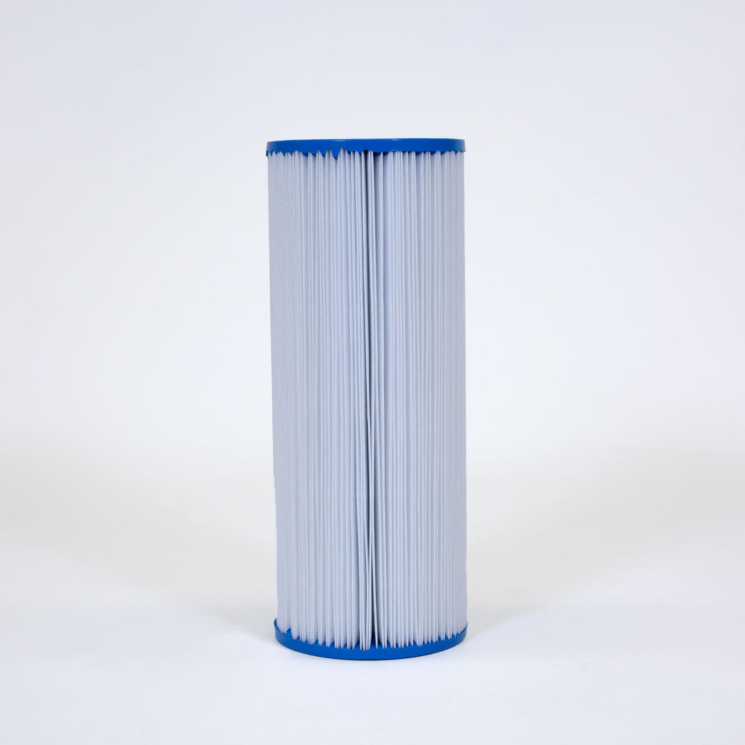 tall cylindrical pool filter cartridge with pleated white material and blue plastic caps on both ends against a white background