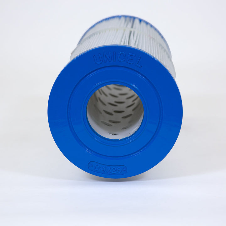 blue end of cylindrical pool filter cartridge with pleated white filter material and perforated interior core