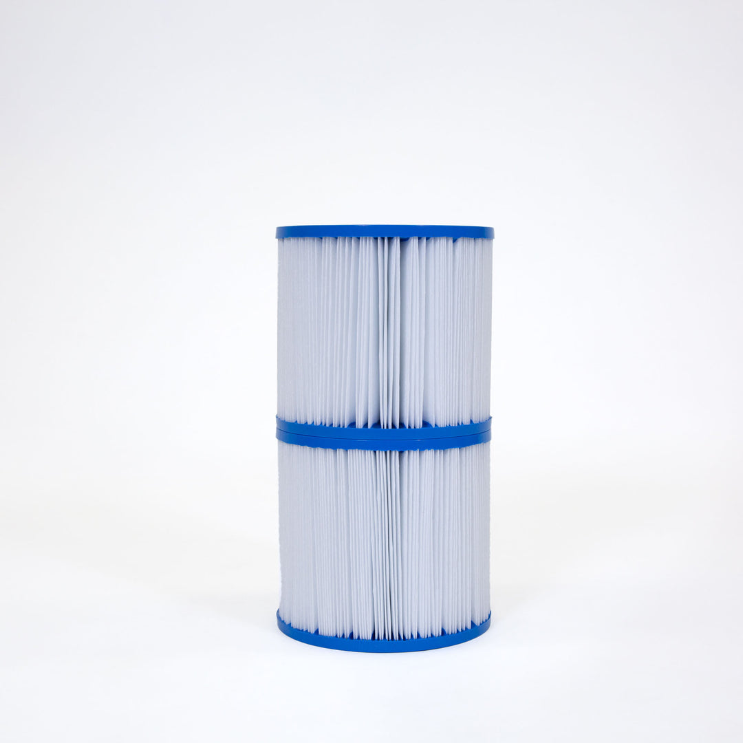 Two cylindrical white and blue pleated pool filter cartridges standing vertically against a plain white background