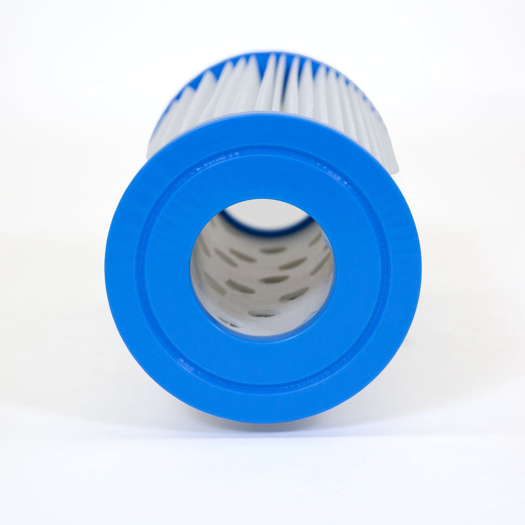 Close-up view of a cylindrical pool filter cartridge with white pleated material and blue plastic end caps against a white background