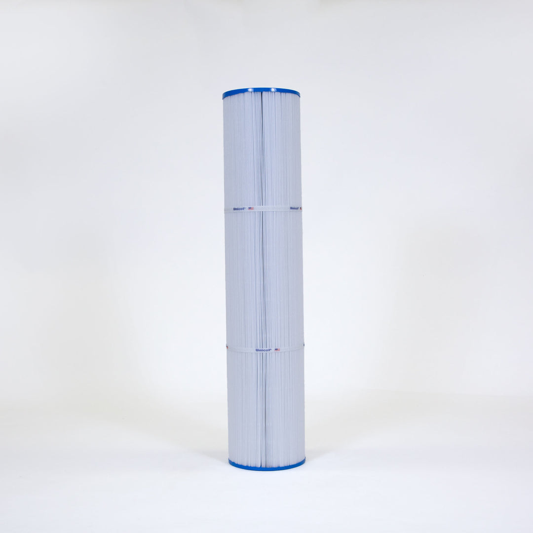 tall cylindrical filter cartridge with white pleated material and blue caps on both ends standing upright on a white surface