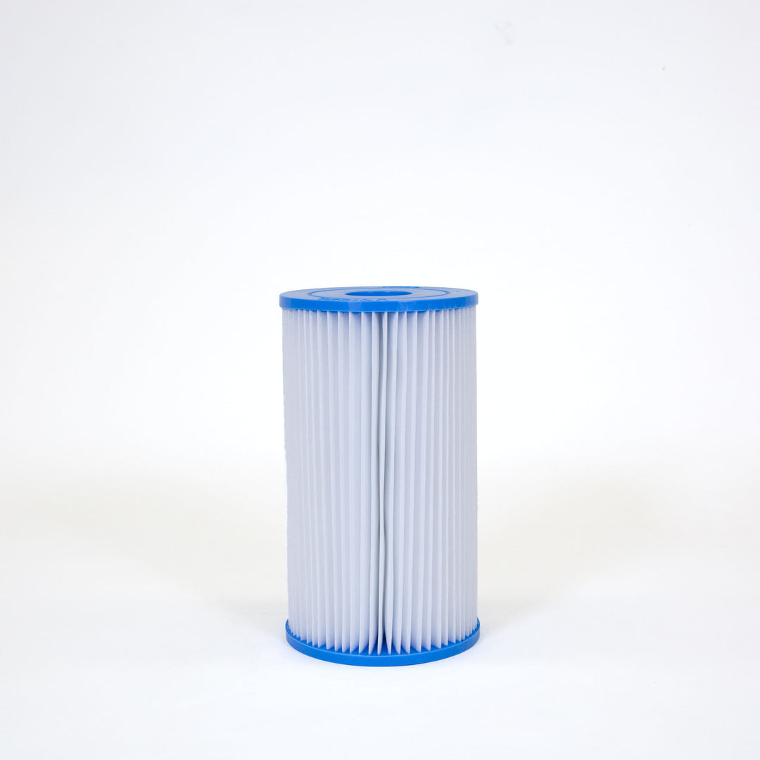 cylindrical pool filter cartridge with white pleated material and blue plastic caps on top and bottom on white background