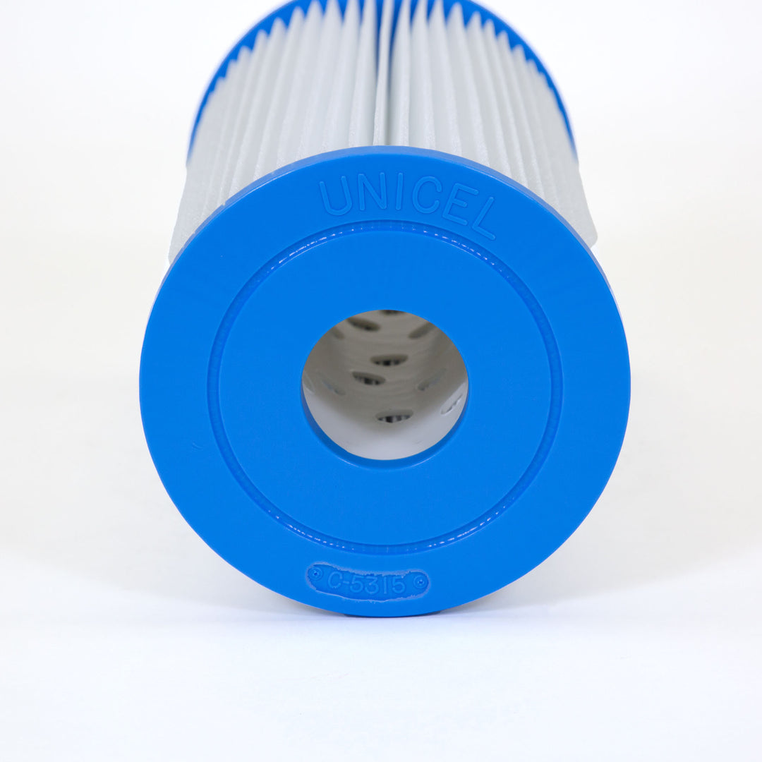 close-up of a cylindrical pool filter cartridge with white pleated material and a blue plastic end cap with UNICEL and C-5315 embossed