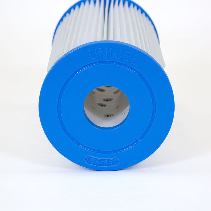 close-up of a cylindrical pool filter cartridge with white pleated material and a blue plastic end cap with UNICEL and C-5315 embossed