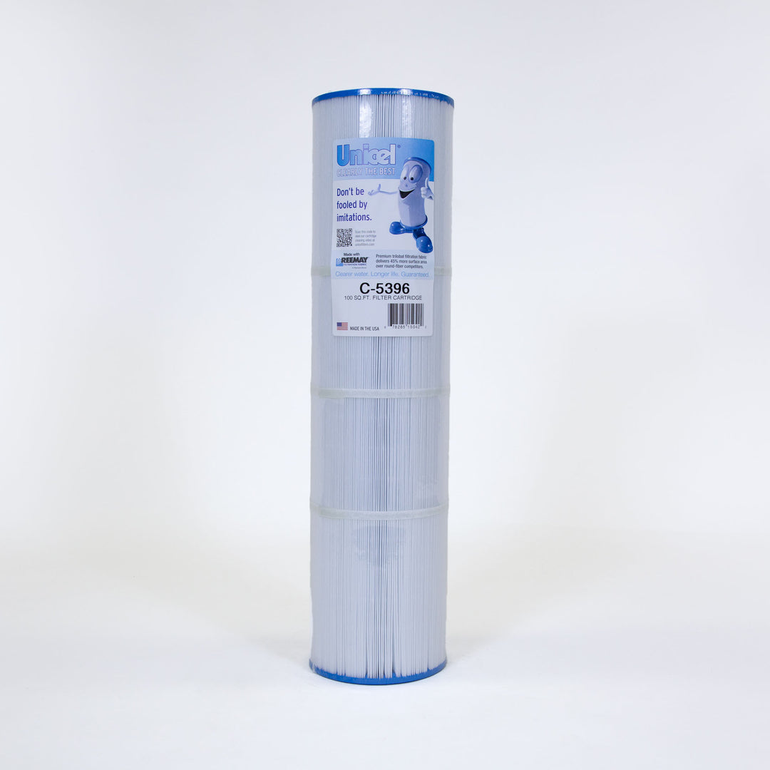 Tall cylindrical pleated white pool or spa filter cartridge with blue edges and a label featuring text and a cartoon character