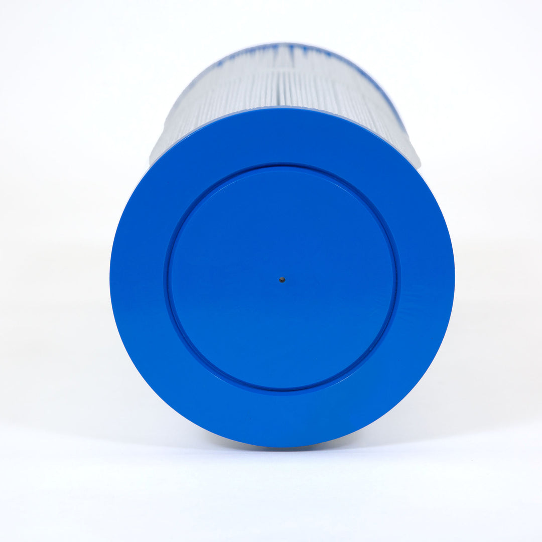 Close-up of a cylindrical spa filter cartridge with blue plastic end caps and white pleated filtering material