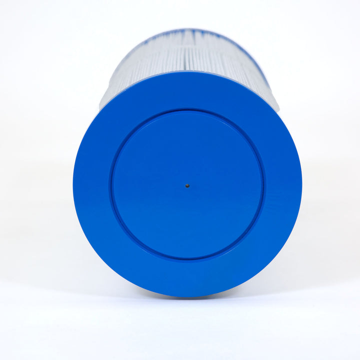 Close-up of a cylindrical spa filter cartridge with blue plastic end caps and white pleated filtering material