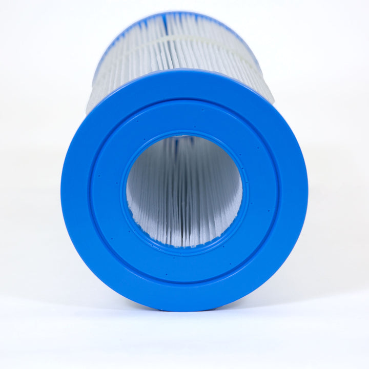 Close-up view of a cylindrical replacement filter cartridge with blue end caps and white pleated filter material