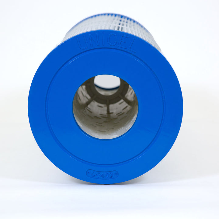 cylindrical pool filter cartridge with a blue plastic end cap embossed with unicel and model c-7450 with white pleated filter material