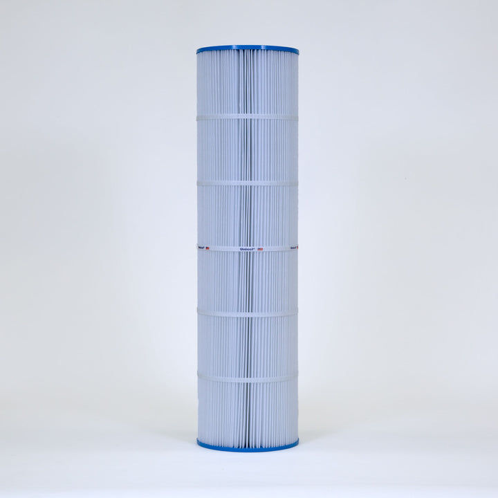 tall cylindrical pool filter cartridge with white pleated material and blue top and bottom edges standing upright on plain background
