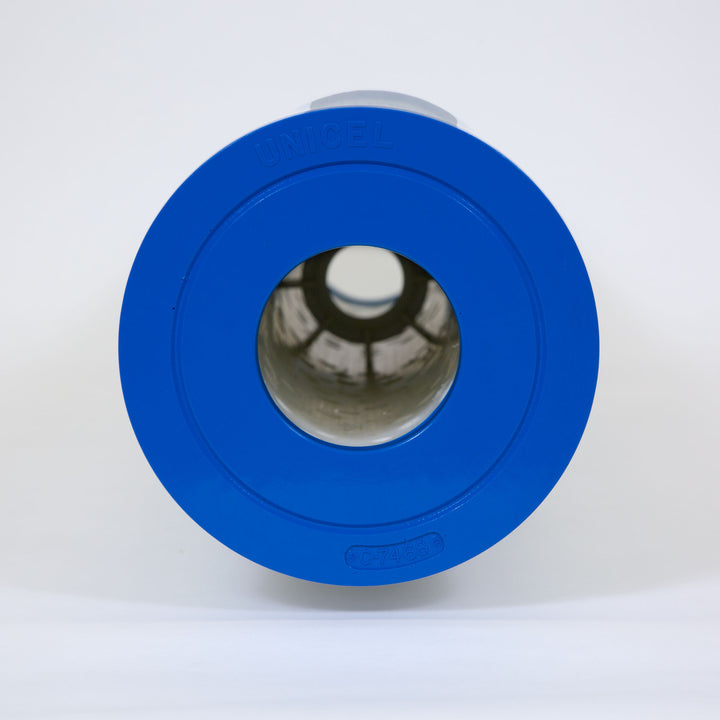 Blue pool filter cartridge end close-up showing Unicel branding and model number C-7468 with visible inner pleated filter