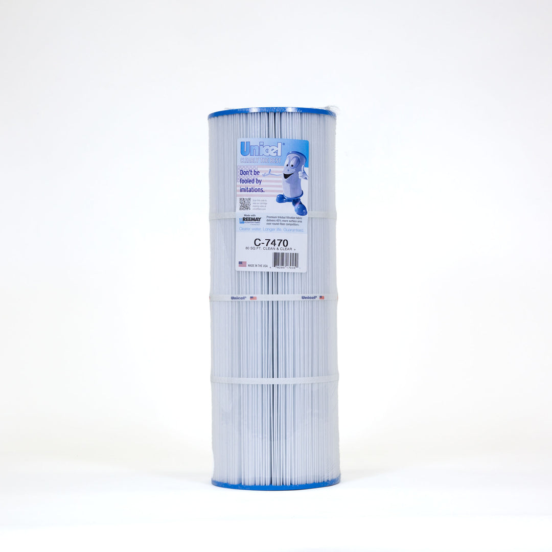 White cylindrical pool filter cartridge with blue edges and multiple vertical pleats standing upright with product label