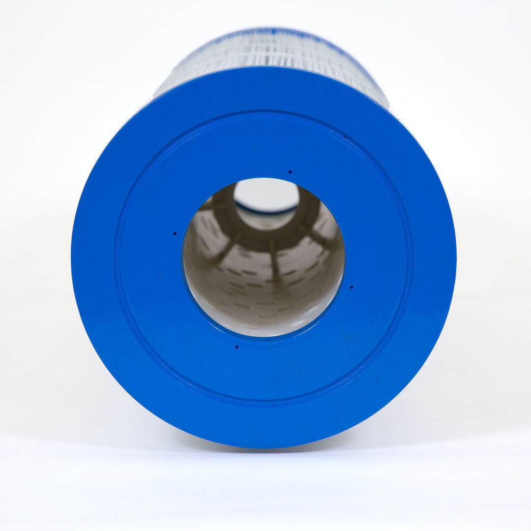 Close-up view of a cylindrical pool filter cartridge with a bright blue plastic end cap and white pleated filtration material