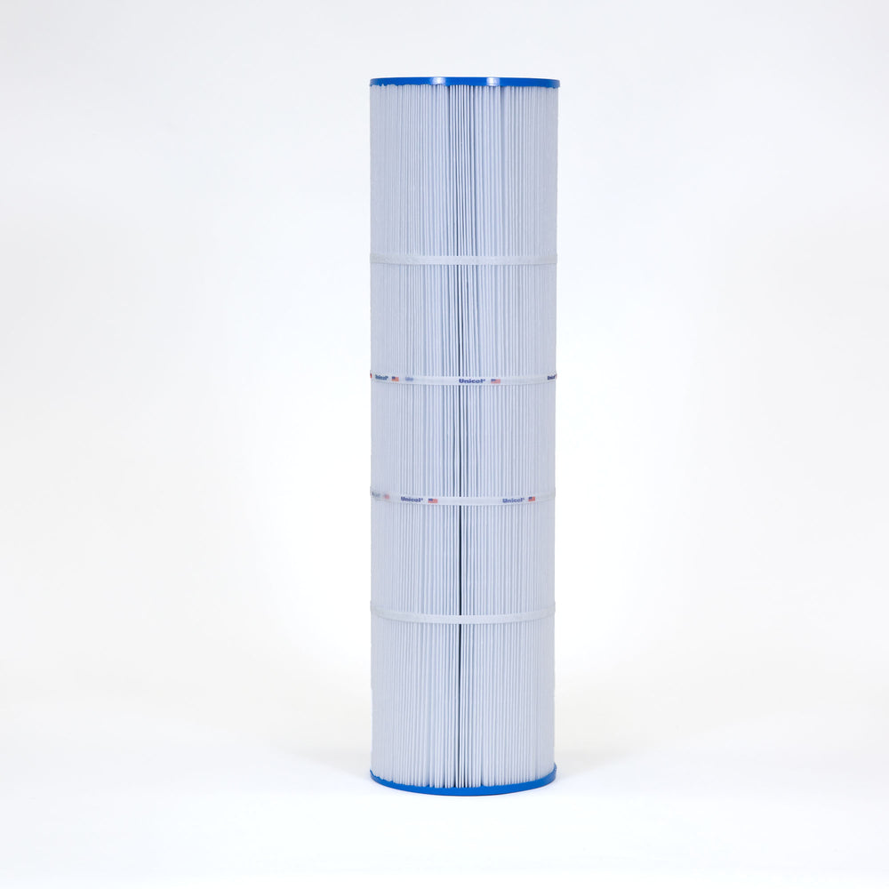 tall cylindrical pool filter cartridge with white pleated fabric and blue plastic ends standing on a white background