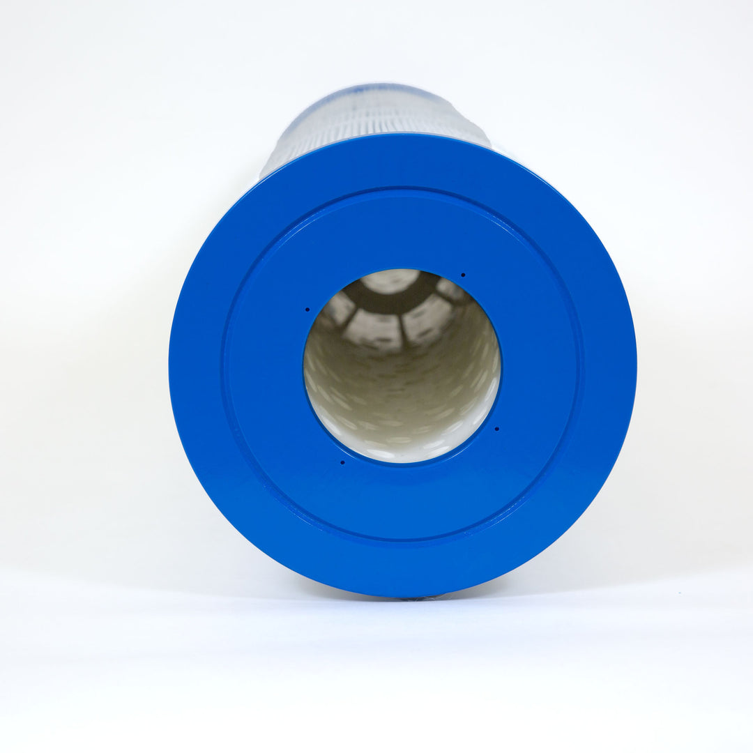 cylindrical replacement filter cartridge with blue end cap and pleated white filter material inside against a plain white background