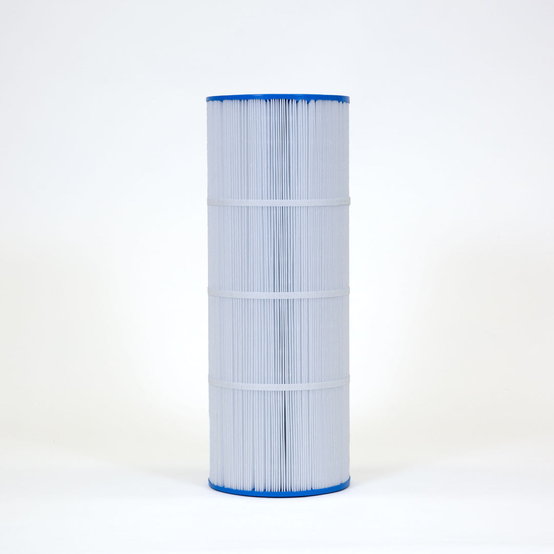 Tall cylindrical pool filter cartridge with white pleated material and blue end caps standing upright on a white background