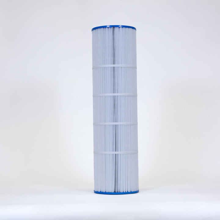 Tall cylindrical pool filter cartridge with white pleated material and blue caps on top and bottom against a plain white background