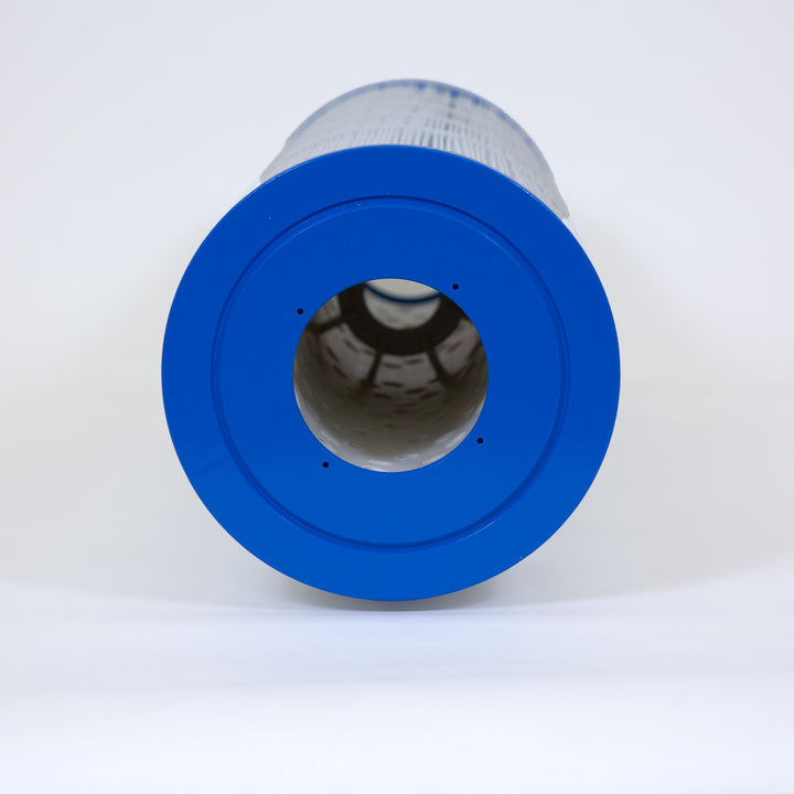 Cylindrical pool filter cartridge with blue end caps and pleated white filtering material viewed from the top