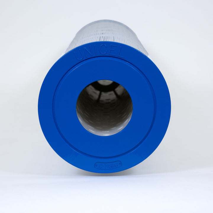 Cylindrical replacement filter cartridge with blue end cap marked UNICEL and model number C-7490 on a white background