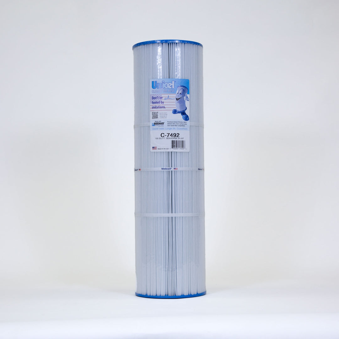 Cylindrical white pool filter cartridge with blue end caps and a label featuring a mascot and product details