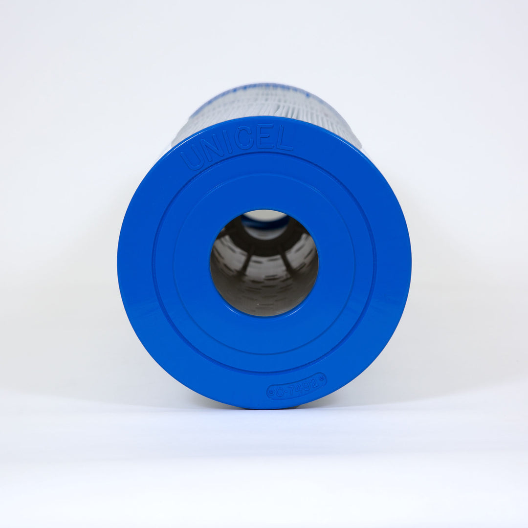 Blue cylindrical replacement filter cartridge for pool or spa with concentric circular designs and central hollow core