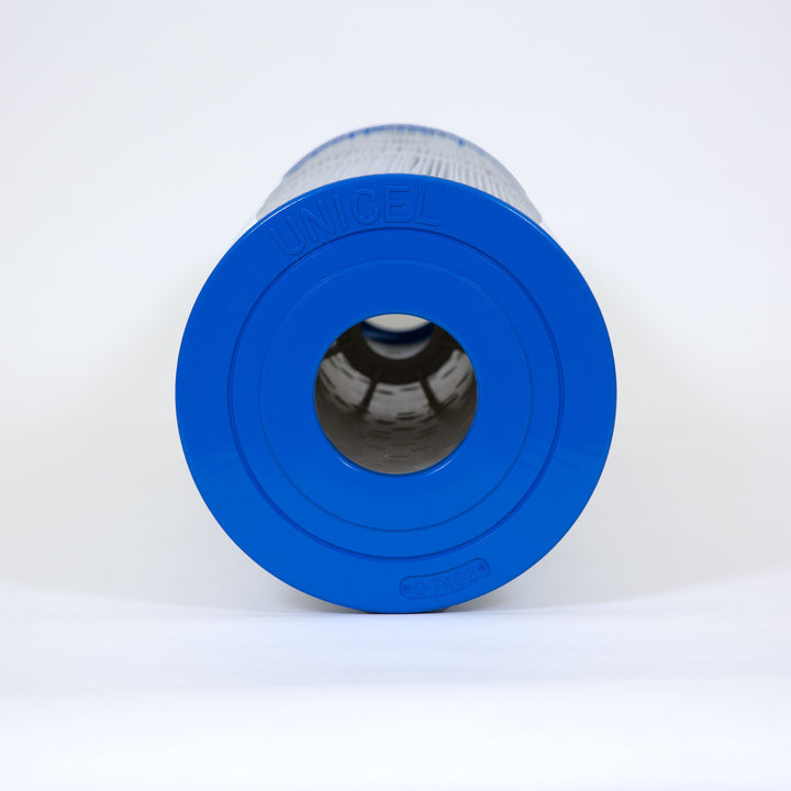 Blue cylindrical replacement filter cartridge for pool or spa with concentric circular designs and central hollow core