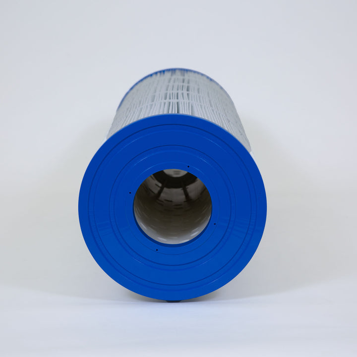 cylindrical pool filter cartridge with white pleated fabric and blue plastic end caps isolated on light grey background