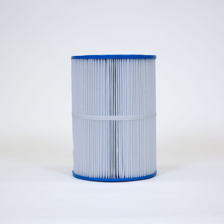 cylindrical white pleated filter cartridge with blue ends placed on white surface against white background