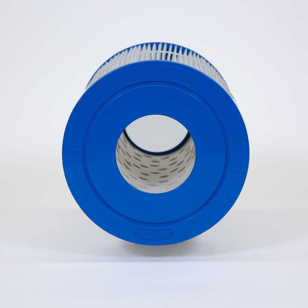 Cylindrical blue and white pool filter cartridge with visible pleated filtering material and central hollow tube
