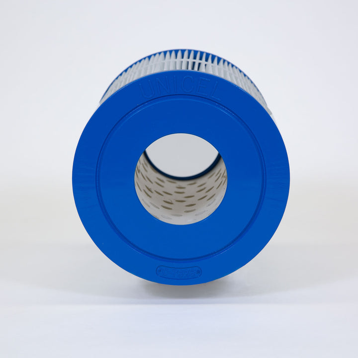 Cylindrical blue and white pool filter cartridge with visible pleated filtering material and central hollow tube