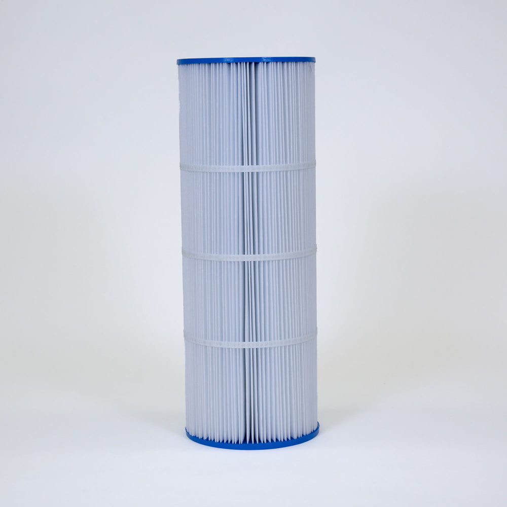 Cylindrical pool filter cartridge with white pleated material and blue plastic end caps on neutral background
